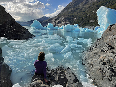 Glacial formations nested in mountain range.