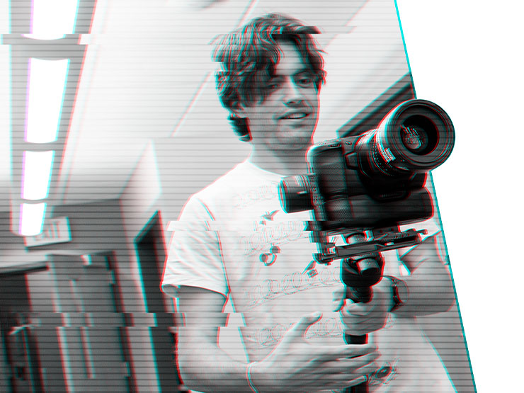 A stylized image of a college student working on a camera.