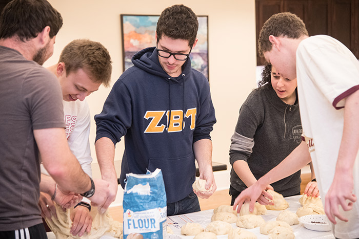 Students attending a culinary event.