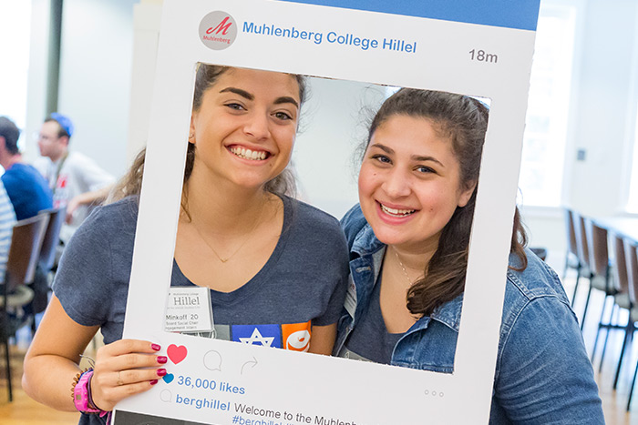 Two students posing for picture