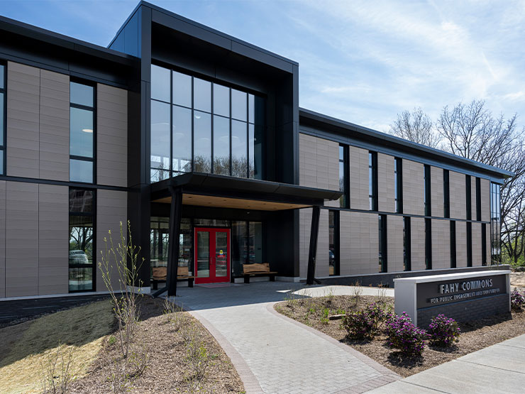 Fahy Commons for Public Engagement and Innovation, a modern-looking building, sits on the Muhlenberg campus during a sunny day.